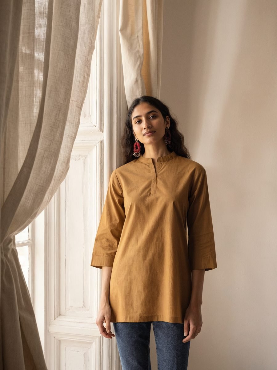 Model wearing a short printed cotton kurti
